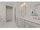 Well-lit bathroom featuring double sink vanity and tile flooring plus tub at 761 Maynard Ln, Summerville, SC 29486