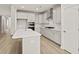 Well-lit kitchen features an island, plenty of cabinets, and stainless steel appliances at 761 Maynard Ln, Summerville, SC 29486