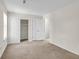 Spacious bedroom with closet, door, and ample natural light, providing a comfortable and inviting atmosphere at 7838 Nummie Ct, North Charleston, SC 29418