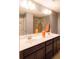 Modern bathroom featuring a double vanity, large mirror, and a glass enclosed shower at 7850 Wilderness Trl # 6A, North Charleston, SC 29418