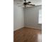 Empty bedroom with hard wood floors, ceiling fan, and window at 804 Temple Rd # B, Ladson, SC 29456