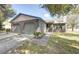 Charming brick home with an attached two-car garage and well-maintained lawn at 804 Temple Rd # B, Ladson, SC 29456