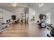 Bright gym with workout equipment, vaulted ceilings, ceiling fans, and windows for natural light at 804 Temple Rd # B, Ladson, SC 29456
