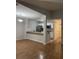 Open concept living room with laminate flooring adjacent to the kitchen at 804 Temple Rd # B, Ladson, SC 29456