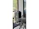 Cozy covered patio featuring a wrought iron table and smoker at 804 Temple Rd # B, Ladson, SC 29456