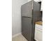 A stainless steel refrigerator is featured, complemented by white cabinets and butcher block countertops at 804 Temple Rd # B, Ladson, SC 29456