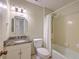 Cozy bathroom featuring a granite vanity top and a tub with shower at 816 Farnham Rd, Charleston, SC 29412