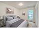 Well-lit bedroom with closet and neutral walls and decor at 816 Farnham Rd, Charleston, SC 29412