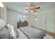 Bright bedroom with modern ceiling fan and a window offering ample natural light at 816 Farnham Rd, Charleston, SC 29412