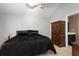 Bedroom with neutral walls, plush carpet, and a comfortable bed with pillows at 8651 Grassy Oaks Trl, North Charleston, SC 29420