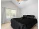 Bedroom with neutral walls, plush carpet, and a comfortable bed with pillows at 8651 Grassy Oaks Trl, North Charleston, SC 29420