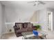 Bonus room with view of a comfortable love seat, and glass coffee table at 8651 Grassy Oaks Trl, North Charleston, SC 29420