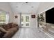 Comfortable living room featuring neutral walls, and french doors leading to backyard at 8651 Grassy Oaks Trl, North Charleston, SC 29420