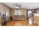 Spacious living room with hardwood floors, neutral colors, and natural lighting at 8653 Grassy Oak Trl, North Charleston, SC 29420