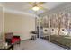 Enclosed patio with a ceiling fan and outdoor furniture, ideal for relaxation and entertaining at 8653 Grassy Oak Trl, North Charleston, SC 29420