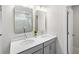 Bright bathroom featuring double sink vanity, large mirrors, and a shower with a glass door at 8654 Windsor Hill Blvd, North Charleston, SC 29420
