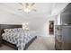 Spacious main bedroom with ceiling fan and access to walk-in closet at 8654 Windsor Hill Blvd, North Charleston, SC 29420