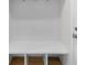 Mudroom including built-in bench seating, coat hooks, cubbies, and tiled floor at 8654 Windsor Hill Blvd, North Charleston, SC 29420