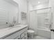 Bright, white bathroom featuring a shower/tub combination and vanity with marble countertop at 1003 Sagegrass St, Summerville, SC 29485