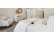 Bright bedroom with neutral decor, a dresser, an accent chair, and modern furnishings at 1003 Sagegrass St, Summerville, SC 29485
