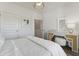 Bright bedroom with a walk-in closet, stylish decor, and a vanity area at 1003 Sagegrass St, Summerville, SC 29485