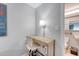 Desk with lamp and a view into the bathroom at 1004 Ocean Blvd # 108, Isle of Palms, SC 29451