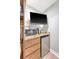 Convenient kitchenette with microwave, refrigerator, coffee maker, storage and granite countertop at 1004 Ocean Blvd # 108, Isle of Palms, SC 29451