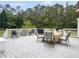 Spacious back deck features outdoor seating, great for entertaining at 1019 Spiers Cir, Bonneau, SC 29431