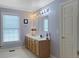 Well-lit bathroom with a double vanity and ample counter space at 1019 Spiers Cir, Bonneau, SC 29431