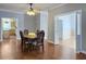 Light-filled dining area adjacent to kitchen with a view of a living room at 1019 Spiers Cir, Bonneau, SC 29431