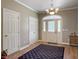 Inviting foyer with hardwood floors, decorative lighting, and a view of the front door at 1019 Spiers Cir, Bonneau, SC 29431