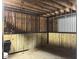 View of a newly constructed horse stall showing wood construction, steel bars and a rubber floor at 1019 Spiers Cir, Bonneau, SC 29431