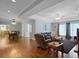 Spacious living area with hardwood floors, ceiling fans, and neutral paint at 1019 Spiers Cir, Bonneau, SC 29431