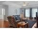 Comfortable living room with hardwood floors and contemporary decor at 1019 Spiers Cir, Bonneau, SC 29431