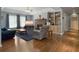 Cozy living room with fireplace, hardwood floors, and built-in shelving at 1019 Spiers Cir, Bonneau, SC 29431