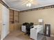 Office with built-in shelves, beige walls and neutral carpeting at 1019 Spiers Cir, Bonneau, SC 29431