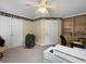 Office with built-in bookshelves, beige walls and neutral carpeting at 1019 Spiers Cir, Bonneau, SC 29431
