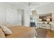 Well-lit bedroom with desk and seating area plus ceiling fan at 104 May Ln, Mount Pleasant, SC 29464