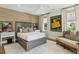 Bright bedroom showcasing stylish decor, ample light, and a comfortable bed at 104 May Ln, Mount Pleasant, SC 29464