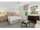 A lovely bedroom with neutral tones, a ceiling fan, and coordinated decor at 104 May Ln, Mount Pleasant, SC 29464