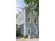 The attractive exterior of the home features classic architectural details at 104 May Ln, Mount Pleasant, SC 29464