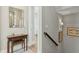 Hallway with stylish console table, decorative mirror, and hardwood floors at 104 May Ln, Mount Pleasant, SC 29464