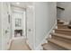 Hallway view showcasing neutral colors, closet space, and hardwood floors at 104 May Ln, Mount Pleasant, SC 29464
