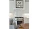 Close up of an oven and white subway tile backsplash in a modern kitchen at 104 May Ln, Mount Pleasant, SC 29464