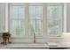 Kitchen window view with natural light and a farmhouse style sink at 104 May Ln, Mount Pleasant, SC 29464