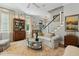 Living room featuring a couch and staircase at 104 May Ln, Mount Pleasant, SC 29464