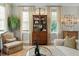 Living room featuring a bookshelf, chairs, and a sofa at 104 May Ln, Mount Pleasant, SC 29464