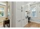 Well lit office space featuring built-in cabinetry, geometric backsplash, and wood flooring at 104 May Ln, Mount Pleasant, SC 29464