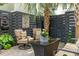 Cozy outdoor living area with comfortable seating, perfect for enjoying the surrounding landscape at 104 May Ln, Mount Pleasant, SC 29464