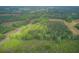 Beautiful acreage with a mix of woodlands, open fields, home, and RV, offering serene countryside living at 1050 Mt Zion Rd, Saint George, SC 29477